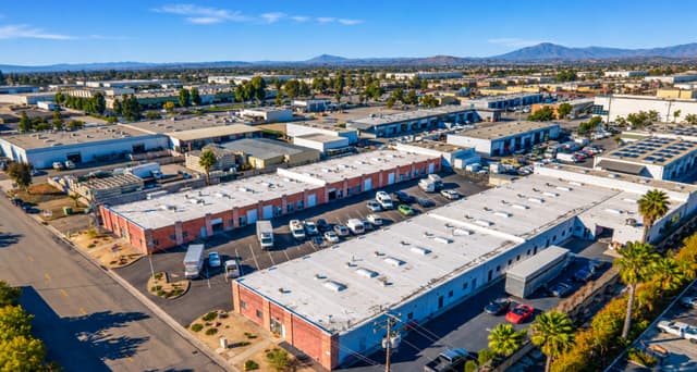 Aerial view of Brickyard Industrial Park, a San Diego industrial business park with multi-tenant brick and white-roofed buildings