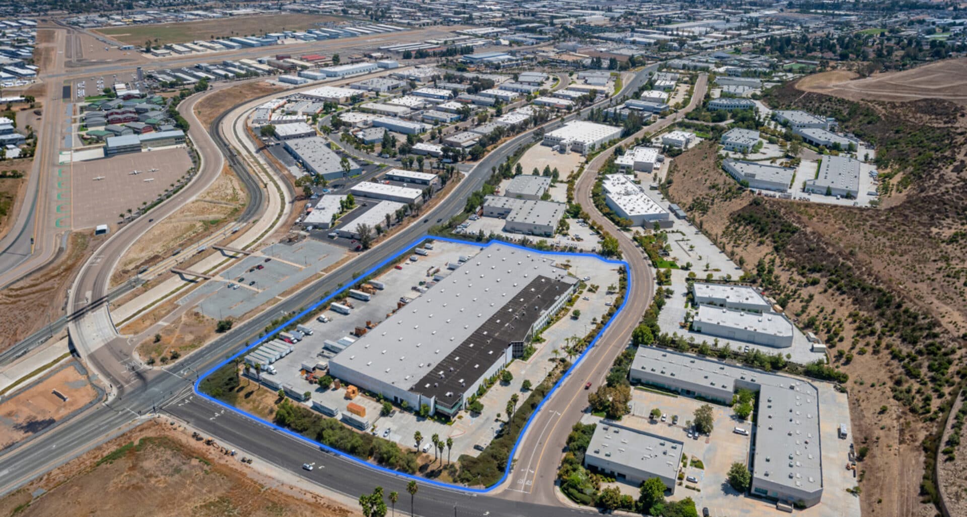 Aerial view of 2025 Gillespie Way industrial distribution building in Gillespie Field Business Park, site of the El Cajon industrial sale