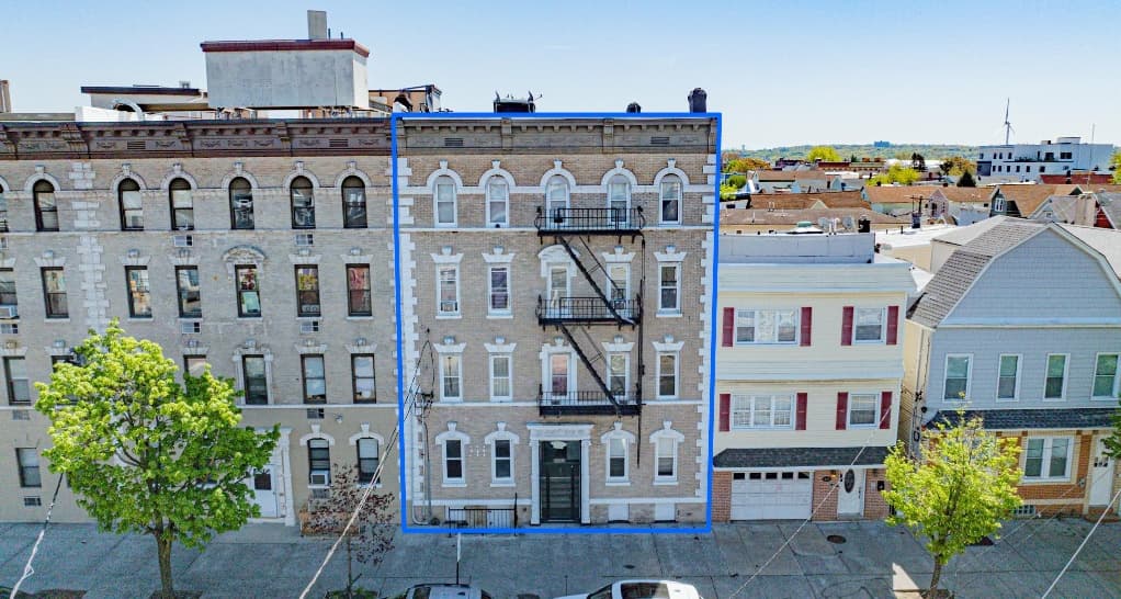 Brick facade of a 12-unit Bayonne multifamily sale property at 514 Kennedy Boulevard in New Jersey
