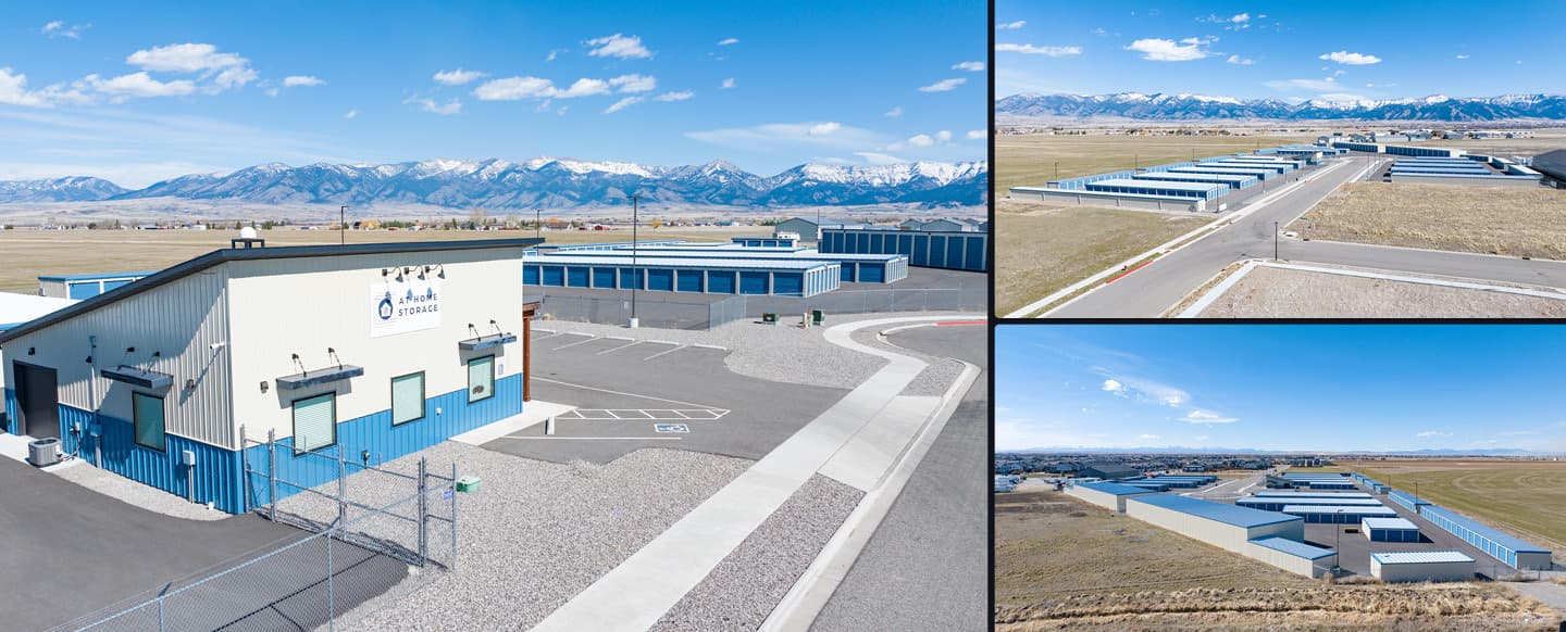 At Home Storage self-storage facility Bozeman MSA with blue-roofed buildings and snowy mountains