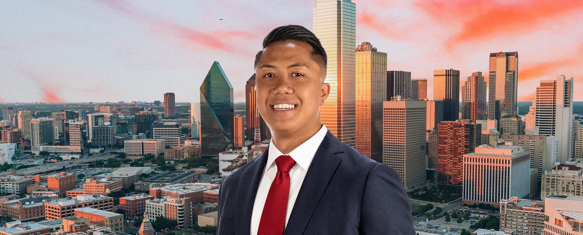 Michael Tran in a suit in front of the Dallas skyline, joining Matthews as an industrial investment sales Dallas specialist